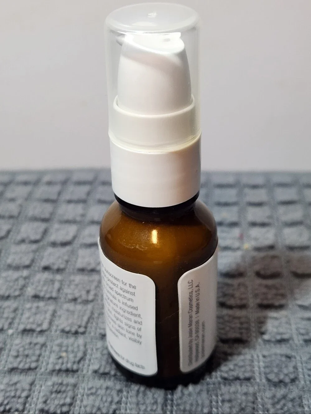 JOSIE MARAN White and Brown Pump Bottle Skincare Serum